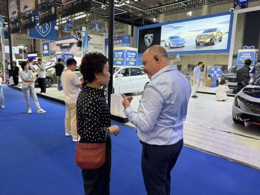 Exhibition booth with international visitors