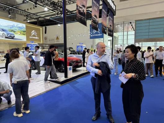 Attendees at trade show booth